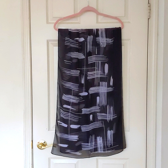 NWOT. Black and White Multi Pattern Scarf. - Picture 3 of 3